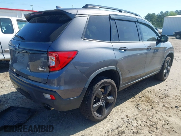 2019 Honda Passport Elite with VIN 5FNYF8H04KB004657, listed as a IAAI auction lot 41993974 with 90,964 mi miles and . Bid and sale history available at DreamBid. Image 4.