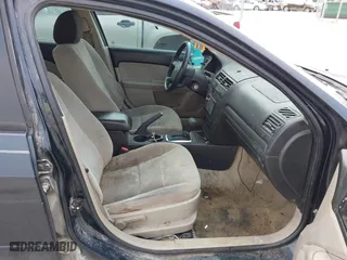 2008 Ford Fusion SE with VIN 3FAHP07148R257239, listed as a IAAI auction lot 41551698 with 218,839 mi miles. Bid and sale history available at carsss.com. Image 5.
