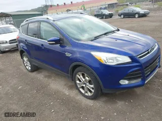2014 Ford Escape Titanium with VIN 1FMCU9J92EUC77618, listed as a IAAI auction lot 42096397 with 140,225 mi miles. Bid and sale history available at carsss.com. Image 1.