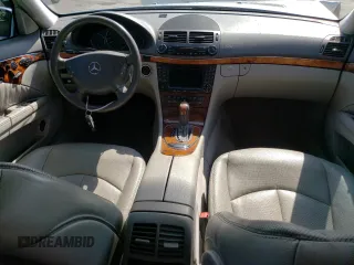 2005 Mercedes-Benz E 500 with VIN WDBUH83J85X167037, listed as a Copart auction lot 65275293 with 107,170 mi miles and Salvage Title. Bid and sale history available at carsss.com. Image 8.