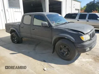 2003 Toyota Tacoma PreRunner z VIN 5TEGM92N43Z281269, wystawiony jako Copart lot #77200284 z przebiegiem 279 039 mil mil oraz Szkoda całkowita • Salvage title. Historia ofert i sprzedaży dostępna na DreamBid. Obrazek 4.