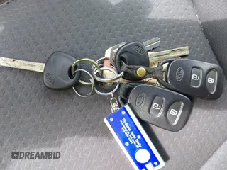 2013 Kia Sorento LX z VIN 5XYKTDA20DG420283, wystawiony jako IAAI lot #42528439 z przebiegiem 140 891 mil mil oraz . Historia ofert i sprzedaży dostępna na DreamBid. Obrazek 11.