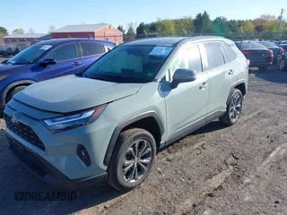2023 Toyota RAV4 Hybrid XLE Premium with VIN JTMB6RFV3PD116696, listed as a IAAI auction lot 42044933 with 18,553 mi miles. Bid and sale history available at carsss.com. Image 17.