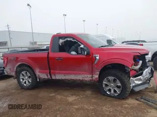 2021 Ford F-150 XL z VIN 1FTMF1E50MKD94460, wystawiony jako IAAI lot #41179111 z przebiegiem 72 256 mil mil oraz . Historia ofert i sprzedaży dostępna na DreamBid. Obrazek 13.