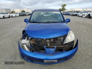 2009 Nissan Versa S with VIN 3N1BC13E19L414565, listed as a Copart auction lot 54275475 with 105,257 mi miles and Salvage Title. Bid and sale history available at DreamBid. Image 5.