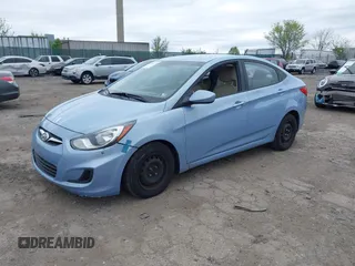 2014 Hyundai Accent GLS with VIN KMHCT4AE3EU702573, listed as a IAAI auction lot 42083350 with 123,392 mi miles. Bid and sale history available at carsss.com. Image 2.