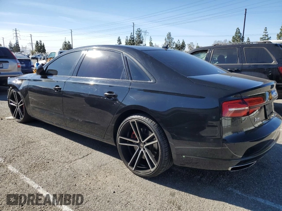 2016 Audi A8 3.0T with VIN WAU34AFD8GN009945, listed as a Copart auction lot 88804115 with 102,341 mi miles and Salvage Title. Bid and sale history available at DreamBid. Image 2.