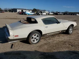 1979 Pontiac Firebird z VIN 2U87K9N120105, wystawiony jako Copart lot #46001565 z przebiegiem 87 739 mil mil oraz Czysty tytuł • Clean title. Historia ofert i sprzedaży dostępna na DreamBid. Obrazek 3.