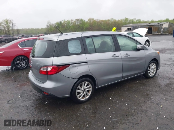 2014 Mazda Mazda5 Sport with VIN JM1CW2BL8E0162982, listed as a IAAI auction lot 41971275 with 85,990 mi miles. Bid and sale history available at carsss.com. Image 4.