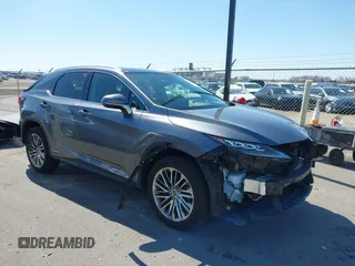 2020 Lexus RX 450h z VIN 2T2JGMDA2LC053394, wystawiony jako IAAI lot #41979007 z przebiegiem 56 331 mil mil oraz . Historia ofert i sprzedaży dostępna na DreamBid. Obrazek 1.