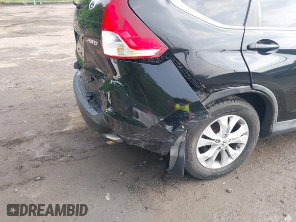 2013 Honda CR-V EX-L z VIN 2HKRM4H74DH635543, wystawiony jako IAAI lot #42266542 z przebiegiem 152 674 mil mil oraz . Historia ofert i sprzedaży dostępna na DreamBid. Obrazek 6.