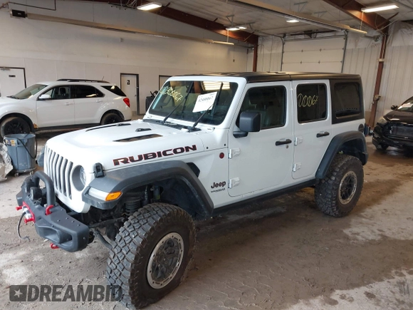 2022 Jeep Wrangler Unlimited Rubicon with VIN 1C4JJXFM0NW154202, listed as a IAAI auction lot 42400067 with 60,486 mi miles and . Bid and sale history available at DreamBid. Image 2.