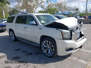 2015 GMC Yukon XL Denali with VIN 1GKS1JKJ0FR504266, listed as a IAAI auction lot 41564098 with 148,203 mi miles. Bid and sale history available at carsss.com. Image 1.