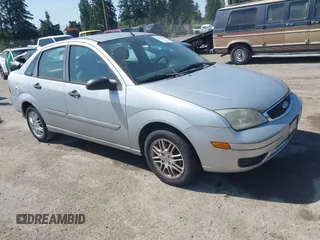 2007 Ford Focus S z VIN 1FAFP34N87W112040, wystawiony jako IAAI lot #42393588 z przebiegiem 45 900 mil mil oraz . Historia ofert i sprzedaży dostępna na DreamBid. Obrazek 1.