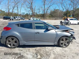 2015 Hyundai Veloster Turbo with VIN KMHTC6AE8FU229198, listed as a IAAI auction lot 41596345 with 74,943 mi miles. Bid and sale history available at carsss.com. Image 13.
