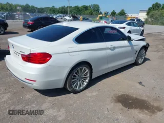 2015 BMW 4 Series 428i xDrive with VIN WBA3N5C52FK484864, listed as a IAAI auction lot 42569077 with 95,431 mi miles and . Bid and sale history available at DreamBid. Image 4.