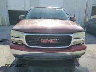 2003 GMC Yukon SLT z VIN 1GKEC13Z63J308578, wystawiony jako Copart lot #53270405 z przebiegiem 308 272 mil mil oraz Szkody całkowita. Historia ofert i sprzedaży dostępna na DreamBid. Obrazek 5.