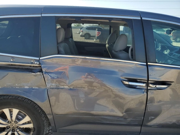 2014 Honda Odyssey EX-L with VIN 5FNRL5H63EB137799, listed as a Copart auction lot 48311285 with 147,596 mi miles and Salvage Title. Bid and sale history available at carsss.com. Image 11.