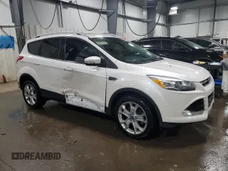 2016 Ford Escape Titanium with VIN 1FMCU9J99GUB20719, listed as a Copart auction lot 46063015 with 85,887 mi miles and Salvage Title. Bid and sale history available at carsss.com. Image 4.