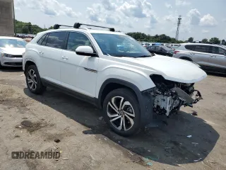 2023 Volkswagen Atlas SEL with VIN 1V2BE2CA4PC216788, listed as a Copart auction lot 65115764 with 13,033 mi miles and Salvage title. Bid and sale history available at DreamBid. Image 4.