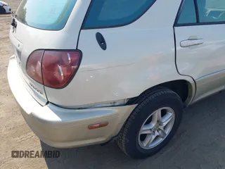 2000 Lexus RX 300 z VIN JT6HF10U8Y0111828, wystawiony jako IAAI lot #42433503 z przebiegiem 237 795 mil mil oraz . Historia ofert i sprzedaży dostępna na DreamBid. Obrazek 6.