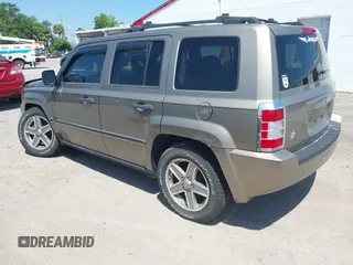 2008 Jeep Patriot Sport with VIN 1J8FT28W18D636073, listed as a IAAI auction lot 42030817 with 103,122 mi miles. Bid and sale history available at carsss.com. Image 3.