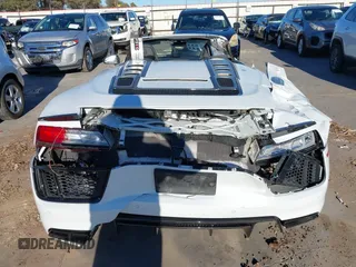2018 Audi R8 Spyder performance z VIN WUA4BCFX7J7902058, wystawiony jako IAAI lot #40861482 z przebiegiem 20 951 mil mil oraz . Historia ofert i sprzedaży dostępna na DreamBid. Obrazek 6.