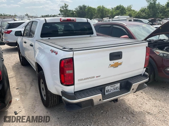 2020 Chevrolet Colorado 4WD Work Truck z VIN 1GCGTBEN8L1146859, wystawiony jako IAAI lot #42561237 z przebiegiem 96 384 mil mil oraz . Historia ofert i sprzedaży dostępna na DreamBid. Obrazek 10.