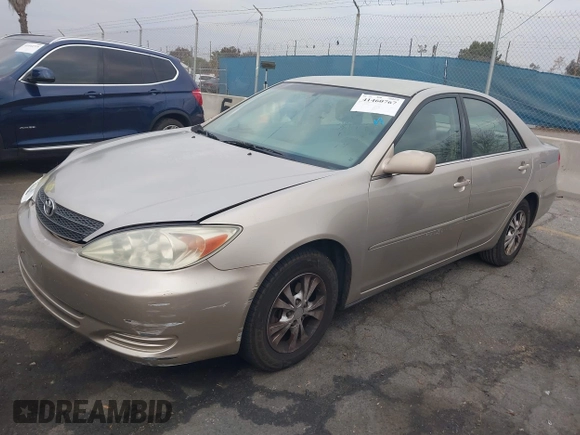 2004 Toyota Camry LE with VIN 4T1BF32K44U069081, listed as a IAAI auction lot 41460767 with 204,992 mi miles and . Bid and sale history available at carsss.com. Image 18.