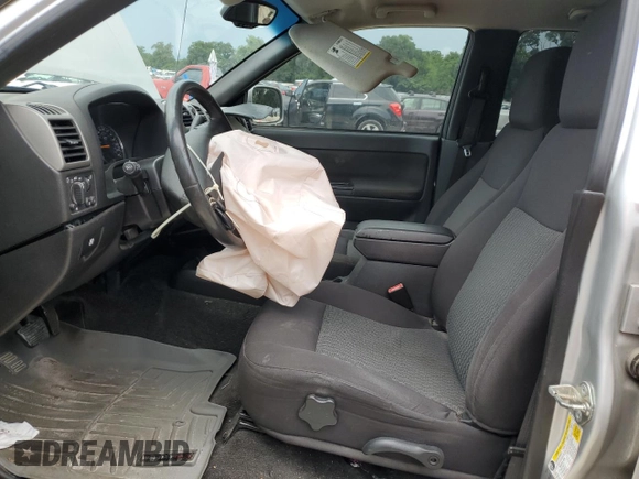 2012 GMC Canyon with VIN 1GTH5PFE3C8167202, listed as a Copart auction lot 64867274 with 238,153 mi miles and Salvage title. Bid and sale history available at DreamBid. Image 7.