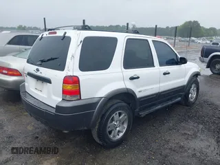 2005 Ford Escape XLT with VIN 1FMCU03195KB11045, listed as a IAAI auction lot 42366299 with 280,737 mi miles and . Bid and sale history available at DreamBid. Image 4.