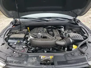 2024 Dodge Durango GT Plus z VIN 1C4RDJDG5RC199745, wystawiony jako Copart lot #69206675 z przebiegiem 5 965 mil mil oraz Szkoda całkowita • Salvage title. Historia ofert i sprzedaży dostępna na DreamBid. Obrazek 16.