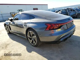 2024 Audi RS e-tron GT z VIN WAUBHBFW8R7901420, wystawiony jako Copart lot #87637305 z przebiegiem 2102 mil mil oraz Szkody całkowita. Historia ofert i sprzedaży dostępna na DreamBid. Obrazek 2.