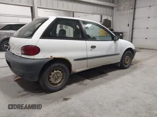 1999 Suzuki Swift z VIN 2S2AB21H1X6603139, wystawiony jako IAAI lot #42288621 z przebiegiem 130 443 mil mil oraz . Historia ofert i sprzedaży dostępna na DreamBid. Obrazek 4.