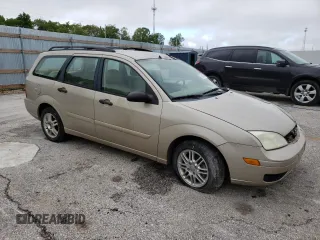 2006 Ford Focus SE with VIN 1FAFP36N66W149227, listed as a Copart auction lot 56008385 with 226,599 mi miles and Salvage title. Bid and sale history available at DreamBid. Image 4.