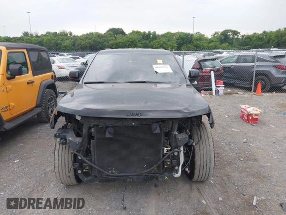 2020 Jeep Grand Cherokee Laredo E with VIN 1C4RJEAG7LC324904, listed as a IAAI auction lot 42600961 with 93,444 mi miles and . Bid and sale history available at DreamBid. Image 12.