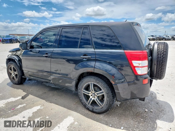 2008 Suzuki Grand Vitara with VIN JS3TE941284104419, listed as a Copart auction lot 63089375 with 216,057 mi miles and Salvage title. Bid and sale history available at DreamBid. Image 2.