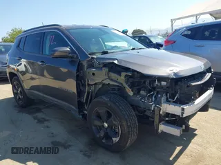 2021 Jeep Compass Latitude with VIN 3C4NJDBB1MT578819, listed as a IAAI auction lot 42288394 with 43,208 mi miles and . Bid and sale history available at DreamBid. Image 1.