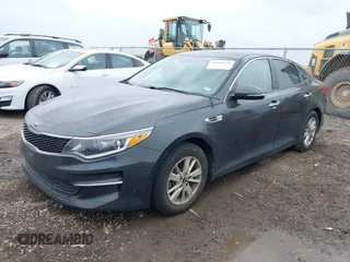 2016 Kia Optima LX with VIN KNAGT4L37G5070799, listed as a IAAI auction lot 41963239 with 116,308 mi miles. Bid and sale history available at carsss.com. Image 22.