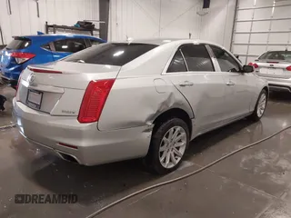 2014 Cadillac CTS Luxury AWD with VIN 1G6AX5SX3E0181029, listed as a IAAI auction lot 41895745 with 68,799 mi miles and . Bid and sale history available at DreamBid. Image 4.