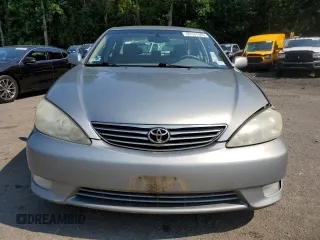 2005 Toyota Camry LE with VIN 4T1BE30K95U590370, listed as a Copart auction lot 63141505 with 238,510 mi miles and Salvage title. Bid and sale history available at DreamBid. Image 5.