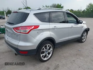 2013 Ford Escape Titanium with VIN 1FMCU9J97DUD16072, listed as a IAAI auction lot 42445993 with 111,255 mi miles and . Bid and sale history available at DreamBid. Image 4.