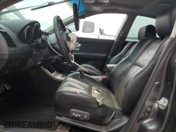 2005 Nissan Altima SE-R with VIN 1N4BL11D55C272885, listed as a Copart auction lot 71732094 with 207,633 mi miles and Salvage title. Bid and sale history available at DreamBid. Image 7.