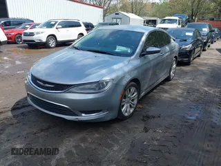 2015 Chrysler 200 Limited with VIN 1C3CCCAB9FN553199, listed as a IAAI auction lot 41988732 with 136,992 mi miles and . Bid and sale history available at DreamBid. Image 2.