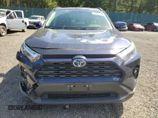 2024 Toyota RAV4 Hybrid XLE Premium with VIN JTMB6RFV7RD129471, listed as a Copart auction lot 53905745 with 8,869 mi miles and Salvage Title. Bid and sale history available at carsss.com. Image 5.