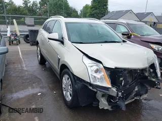 2015 Cadillac SRX Luxury Collection с VIN 3GYFNBE39FS509932, выставлен на аукционе IAAI как лот 42674928 с пробегом 138 393 миль миль и . История ставок и продаж доступна на DreamBid. Изображение 1.