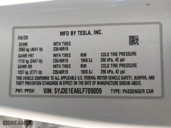 2020 Tesla Model 3 Standard Range Plus with VIN 5YJ3E1EA6LF709009, listed as a IAAI auction lot 40986966 with 116,495 mi miles. Bid and sale history available at carsss.com. Image 9.