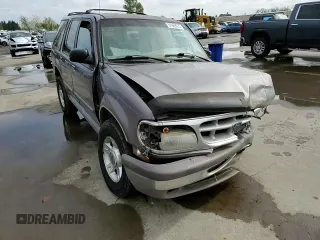 1996 Ford Explorer XL z VIN 1FMDU34X6TZB71667, wystawiony jako Copart lot #51969375 z przebiegiem 226 288 mil mil oraz Szkody całkowita. Historia ofert i sprzedaży dostępna na DreamBid. Obrazek 11.