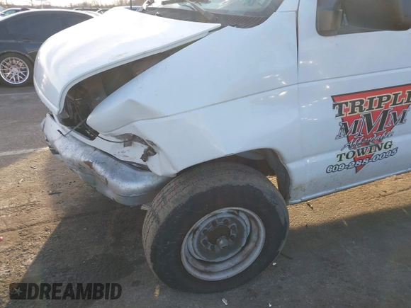 2000 Ford Econoline Cargo Commercial with VIN 1FTNE24L7YHB21192, listed as a IAAI auction lot 41470470 with 132,688 mi miles and . Bid and sale history available at carsss.com. Image 6.