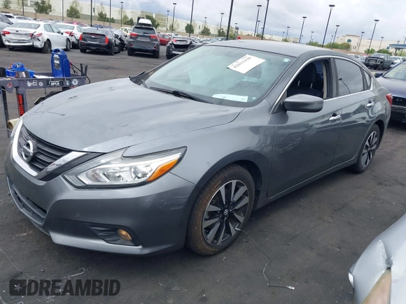 2018 Nissan Altima SV with VIN 1N4AL3AP3JC255885, listed as a IAAI auction lot 42033198 with 134,998 mi miles and . Bid and sale history available at DreamBid. Image 18.